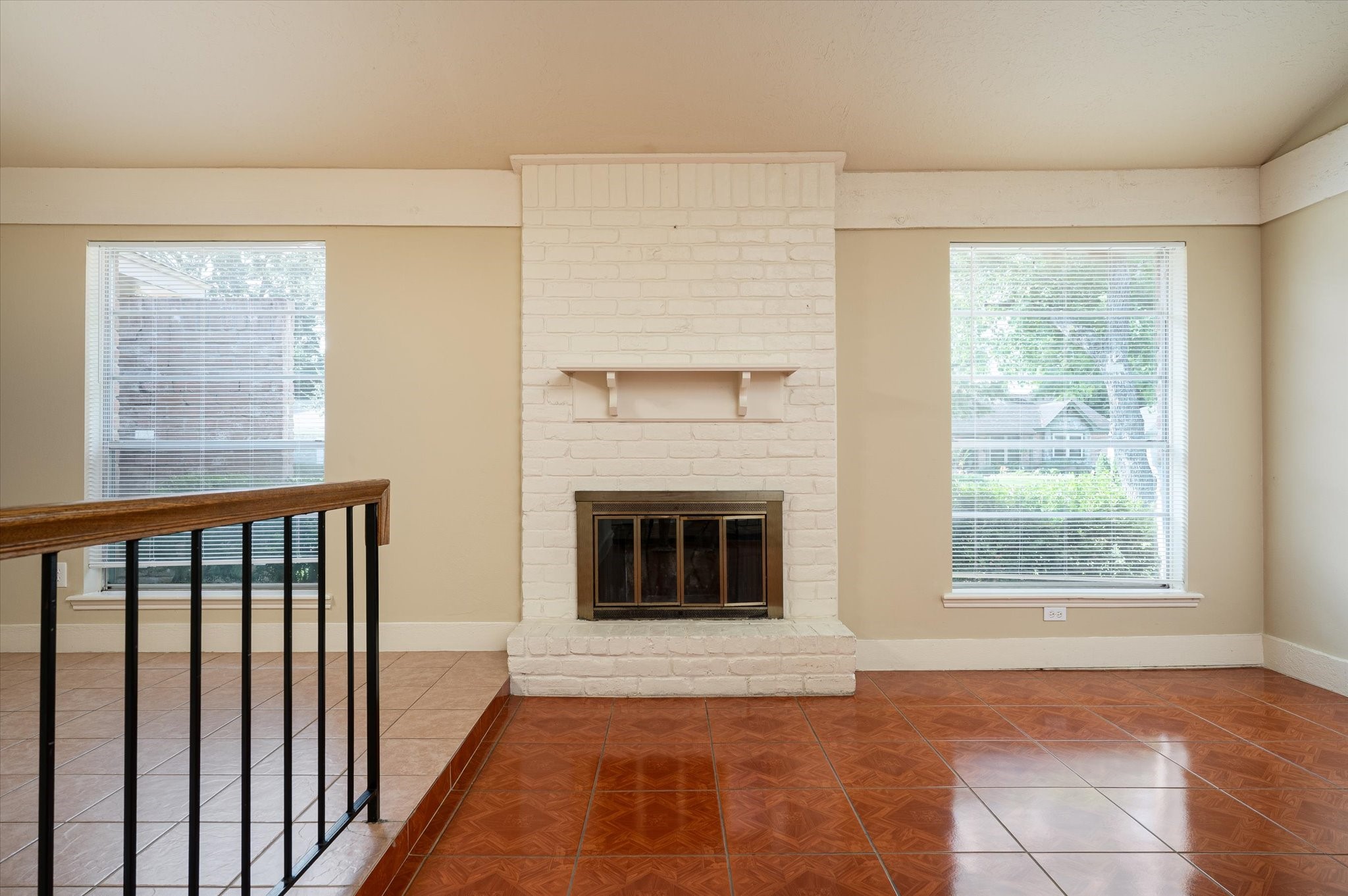 9306 Sanford Road Houston, TX 77031 - Photo 5 of 29 a view of an empty room with a window and fire place