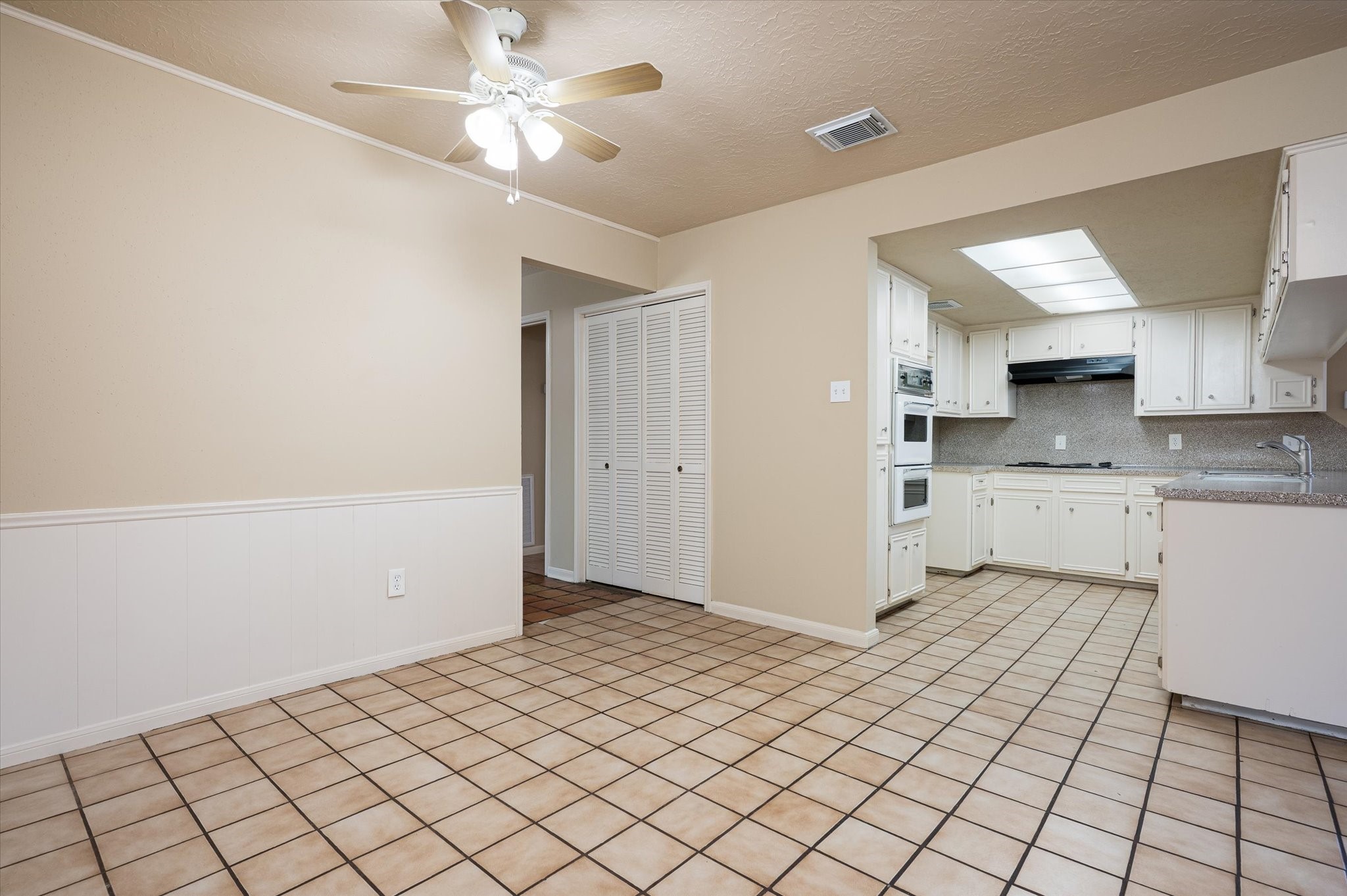 9306 Sanford Road Houston, TX 77031 - Photo 8 of 29 a view of kitchen with granite countertop cabinets and white appliances
