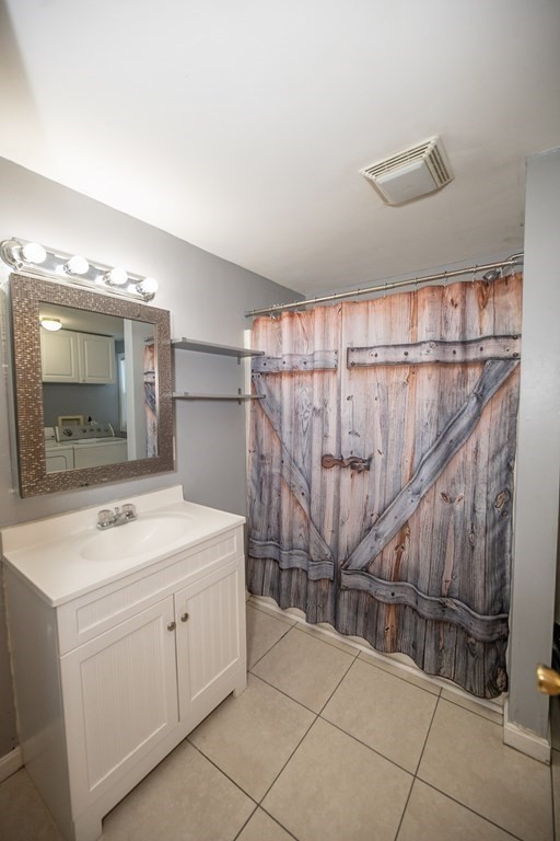 200 North Street, Unit 16C Danvers, MA 01923 - Photo 6 of 8 a utility room with a washer and dryer