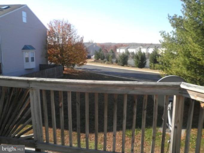 4085 Jasper Loop Dumfries, VA 22025 - Photo 15 of 15 a view of a balcony with an outdoor space