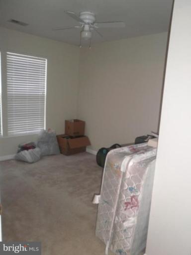 4085 Jasper Loop Dumfries, VA 22025 - Photo 9 of 15 a room with a couch