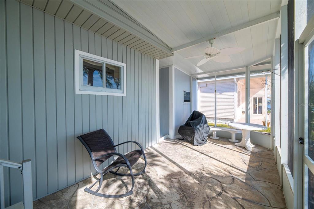 10011 110th Place, Unit 246 Largo, FL 33773 - Photo 23 of 31 a bedroom with a bed and a window