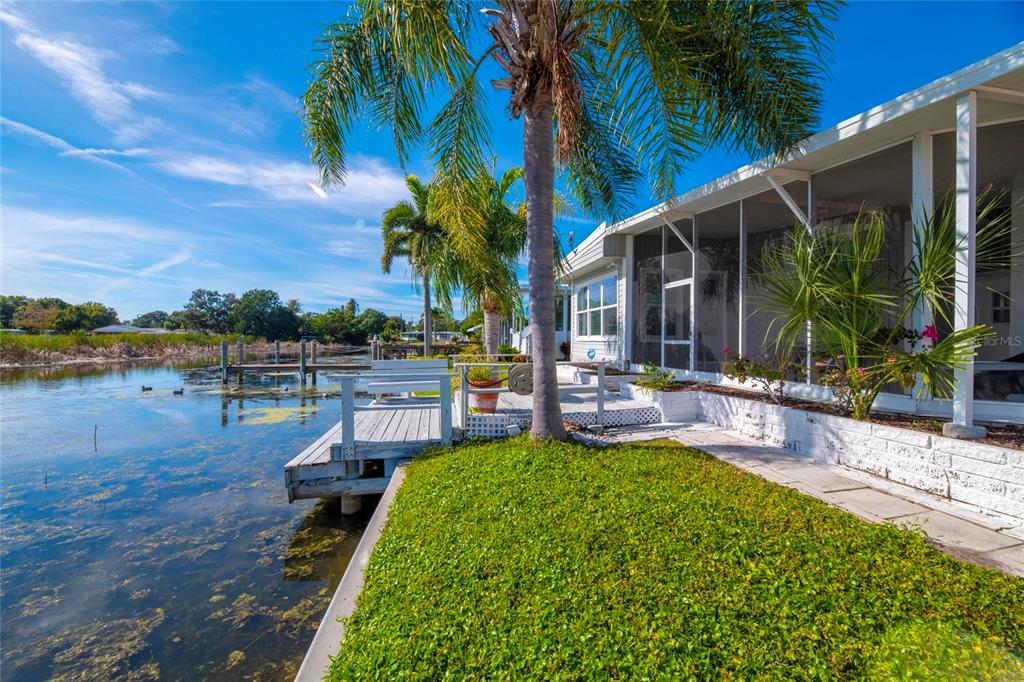 10011 110th Place, Unit 246 Largo, FL 33773 - Photo 4 of 31 a view of a house with a patio