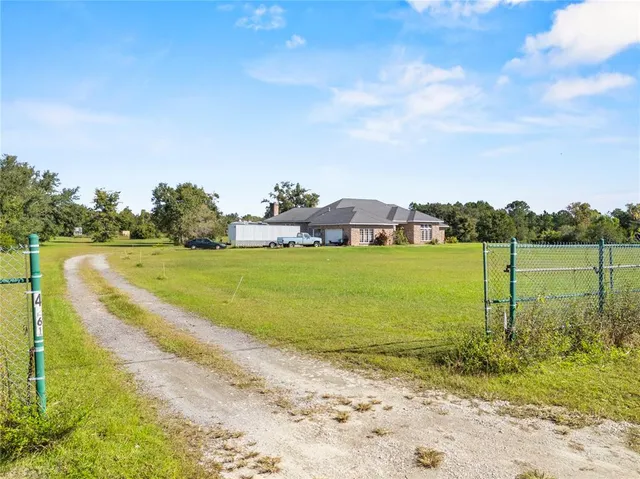 a view of a lake with a big yard