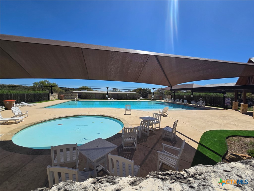 216 George Dolson Blanco, TX 78606 - Photo 14 of 17 a view of swimming pool with seating area