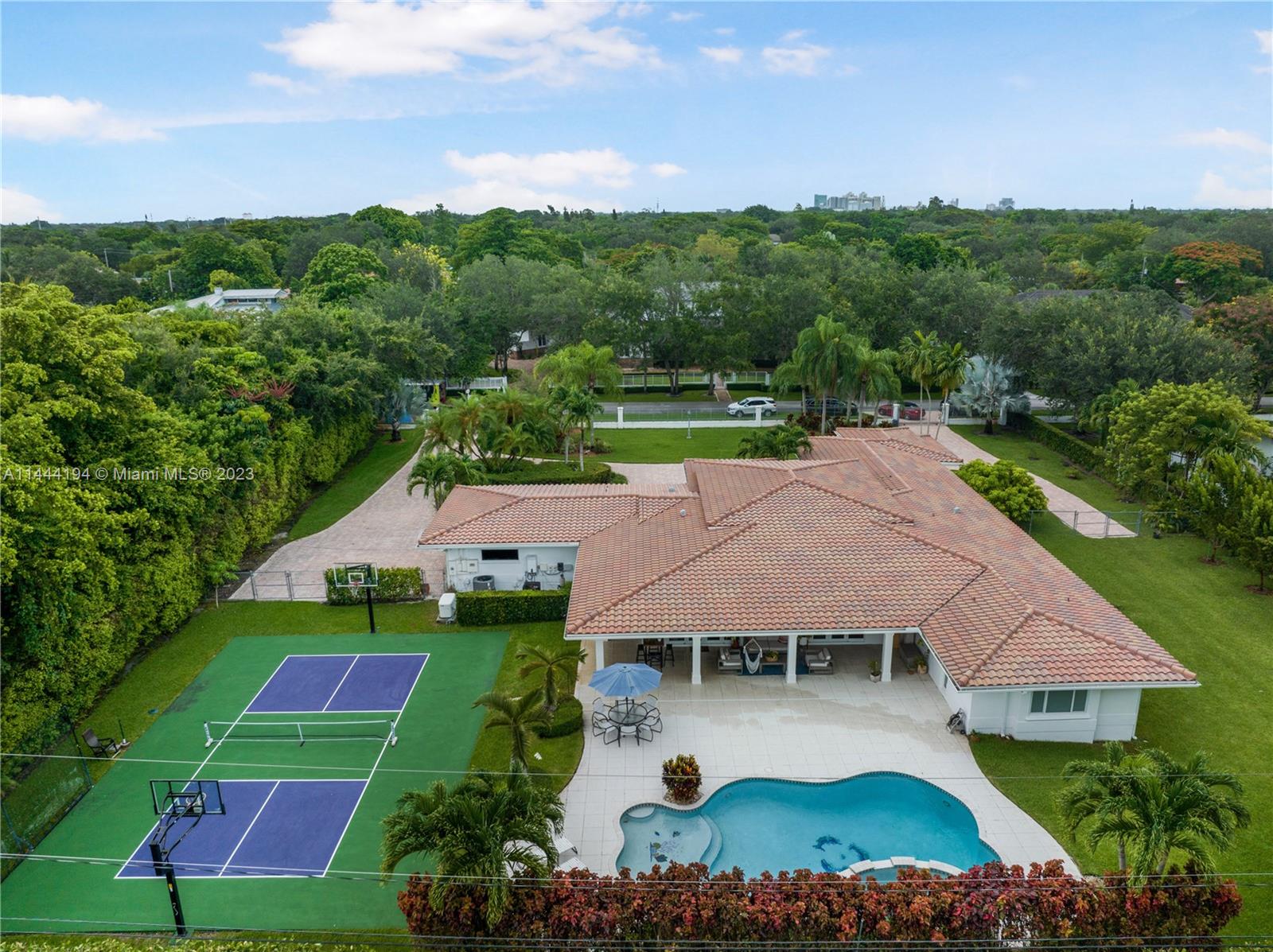 7900 Southwest 129th Terrace Pinecrest, FL 33156 - Photo 53 of 57 an aerial view of a house