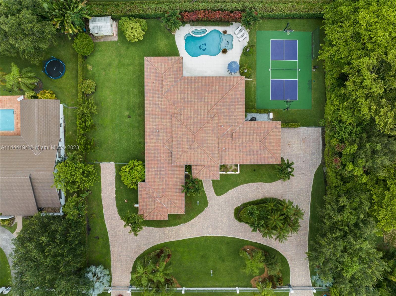 7900 Southwest 129th Terrace Pinecrest, FL 33156 - Photo 57 of 57 an aerial view of a house