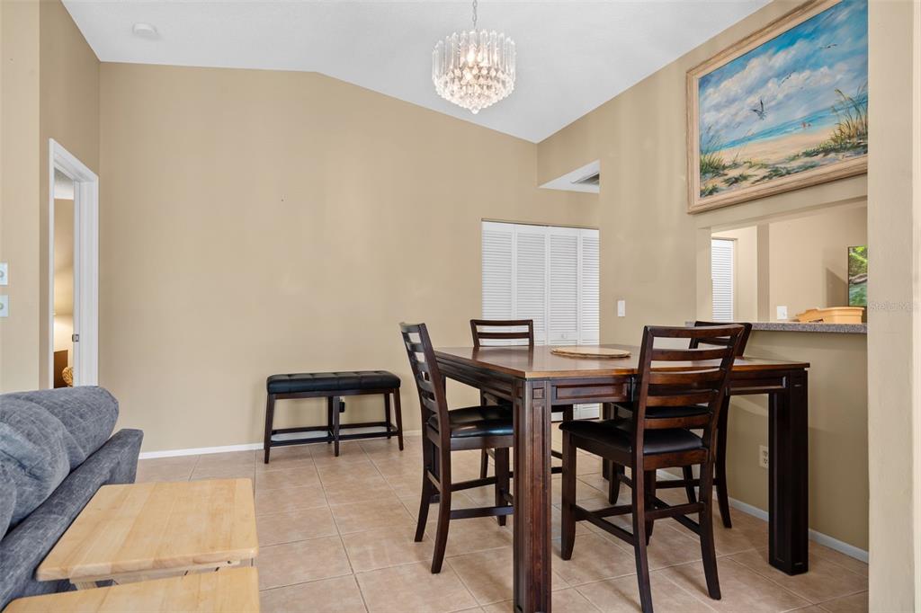 3201 McMath Drive Palm Harbor, FL 34684 - Photo 15 of 59 a view of a dining room with furniture