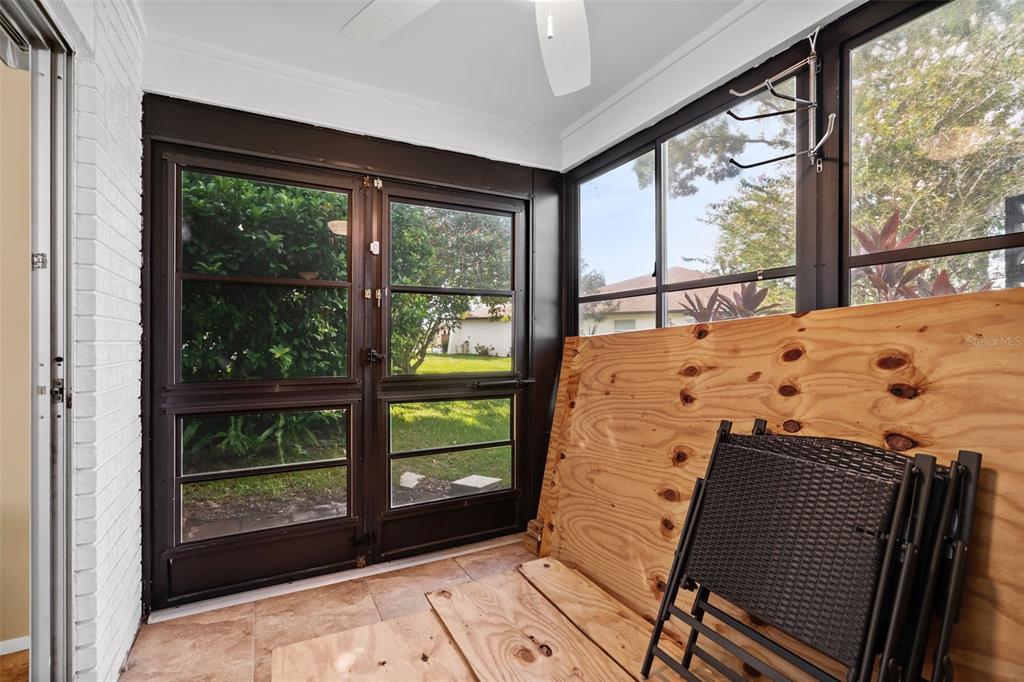 3201 McMath Drive Palm Harbor, FL 34684 - Photo 22 of 59 a bed sitting in a bedroom next to a window