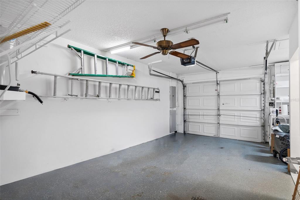 3201 McMath Drive Palm Harbor, FL 34684 - Photo 32 of 59 a view of a livingroom with a ceiling fan