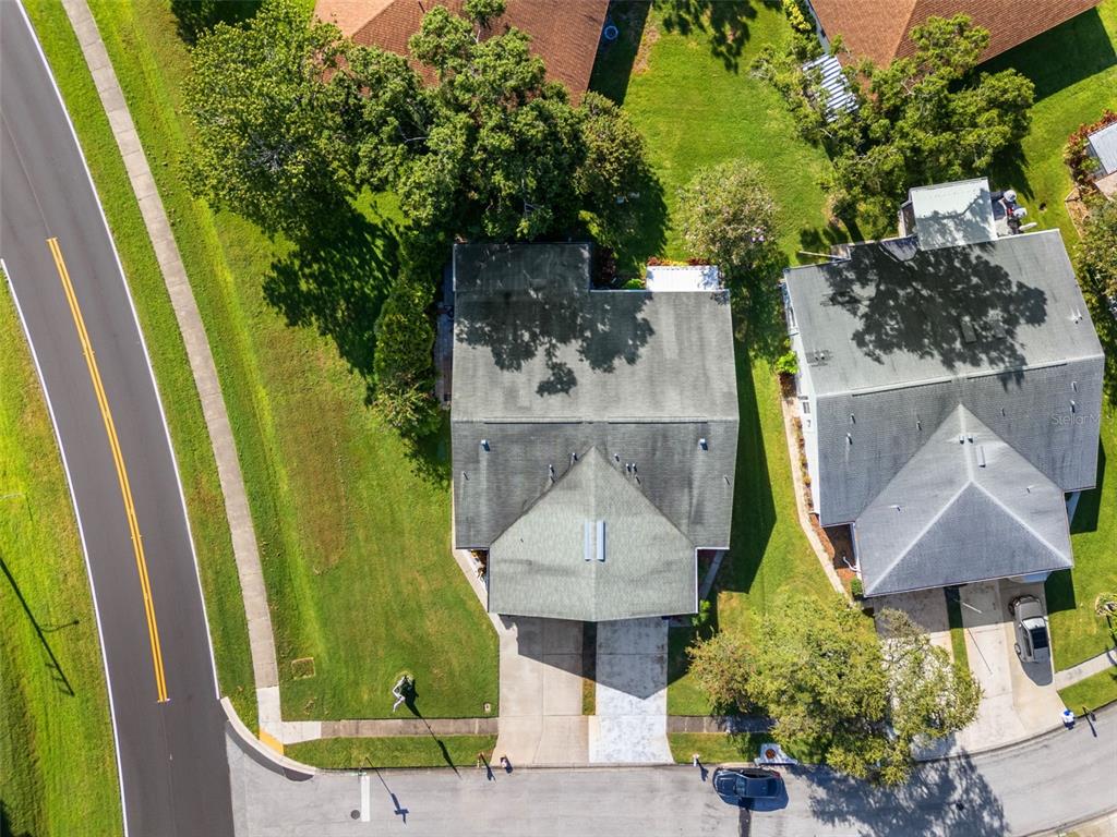3201 McMath Drive Palm Harbor, FL 34684 - Photo 35 of 59 an aerial view of a house with swimming pool garden and patio