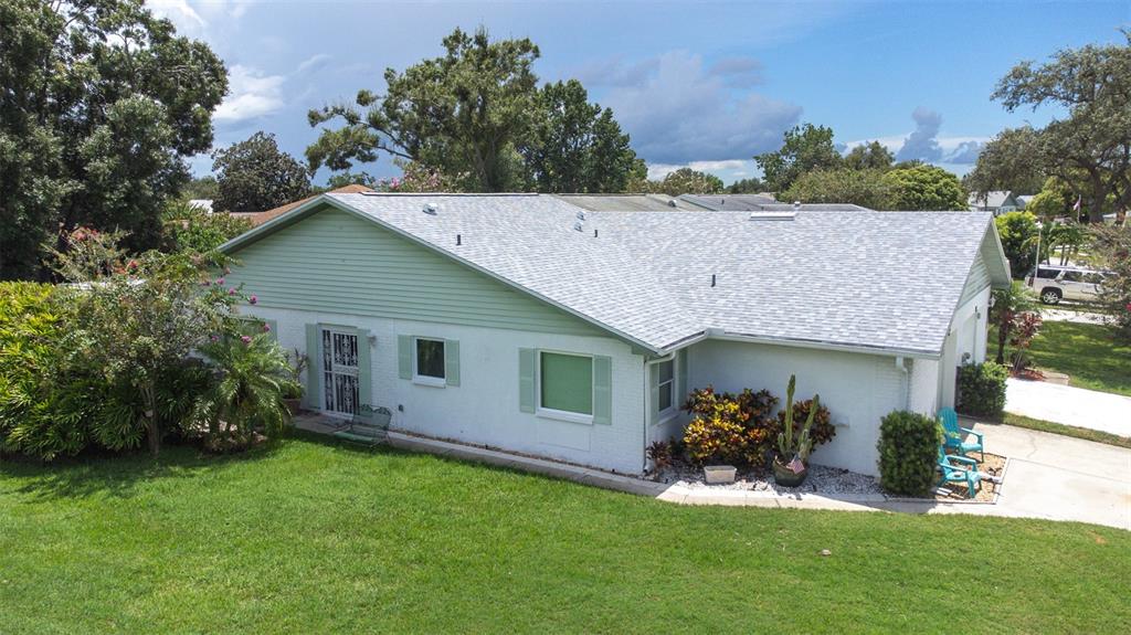 3201 McMath Drive Palm Harbor, FL 34684 - Photo 40 of 59 a house that has a big yard in front of it