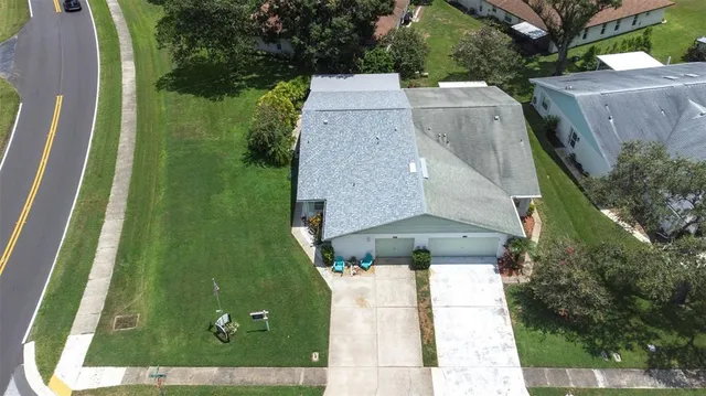 an aerial view of residential building and lake view
