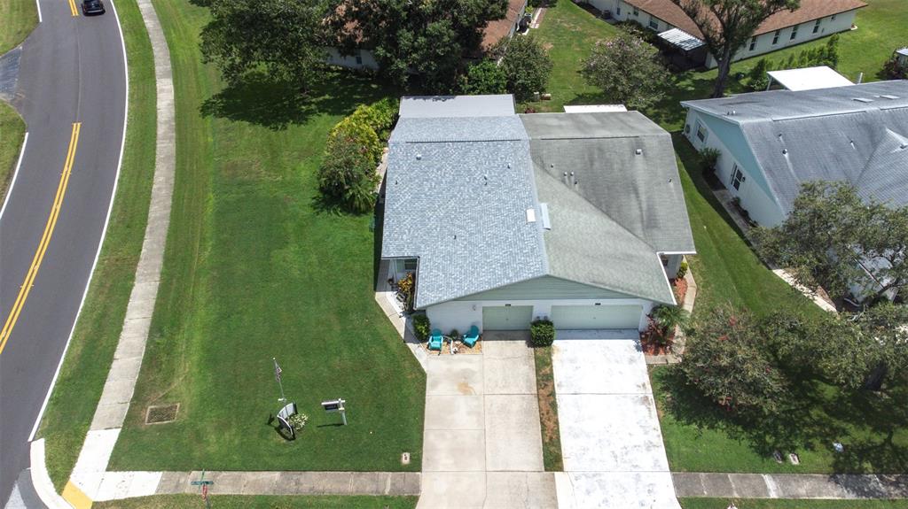 3201 McMath Drive Palm Harbor, FL 34684 - Photo 44 of 59 an aerial view of a house with a yard