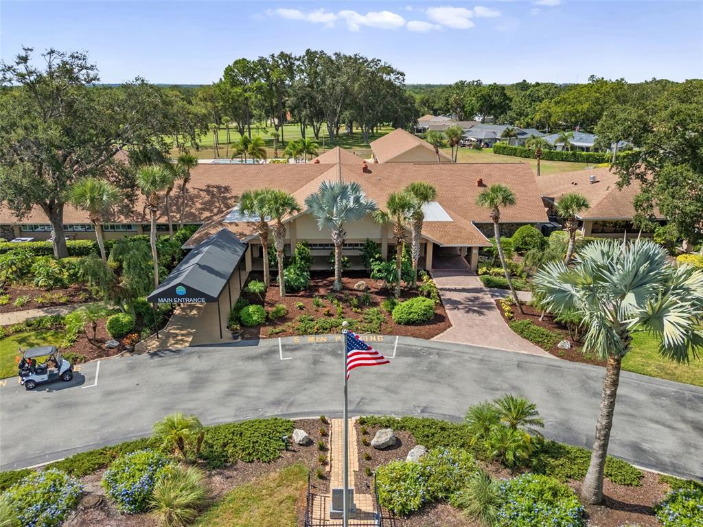 3201 McMath Drive Palm Harbor, FL 34684 - Photo 57 of 59 an aerial view of a house with a lake view