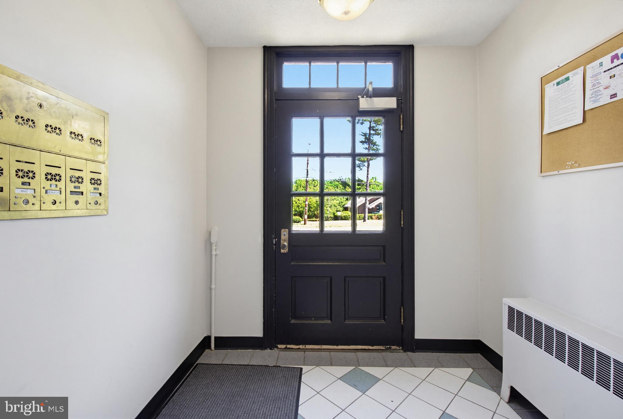 2214 Colston Drive, Unit 201 Silver Spring, MD 20910 - Photo 30 of 43 a view of entryway with wooden floor