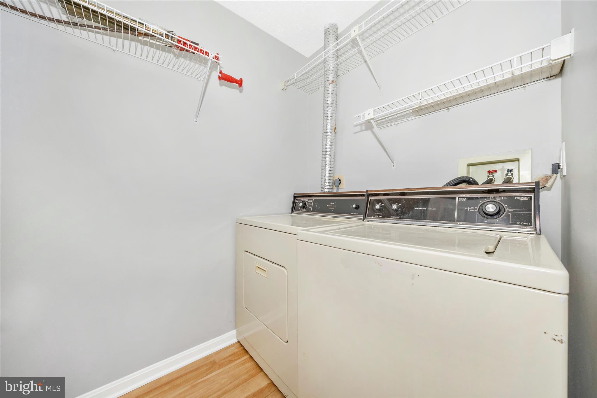 2137 Wainwright Court, Unit 1B Frederick, MD 21702 - Photo 37 of 55 a utility room with dryer and washer