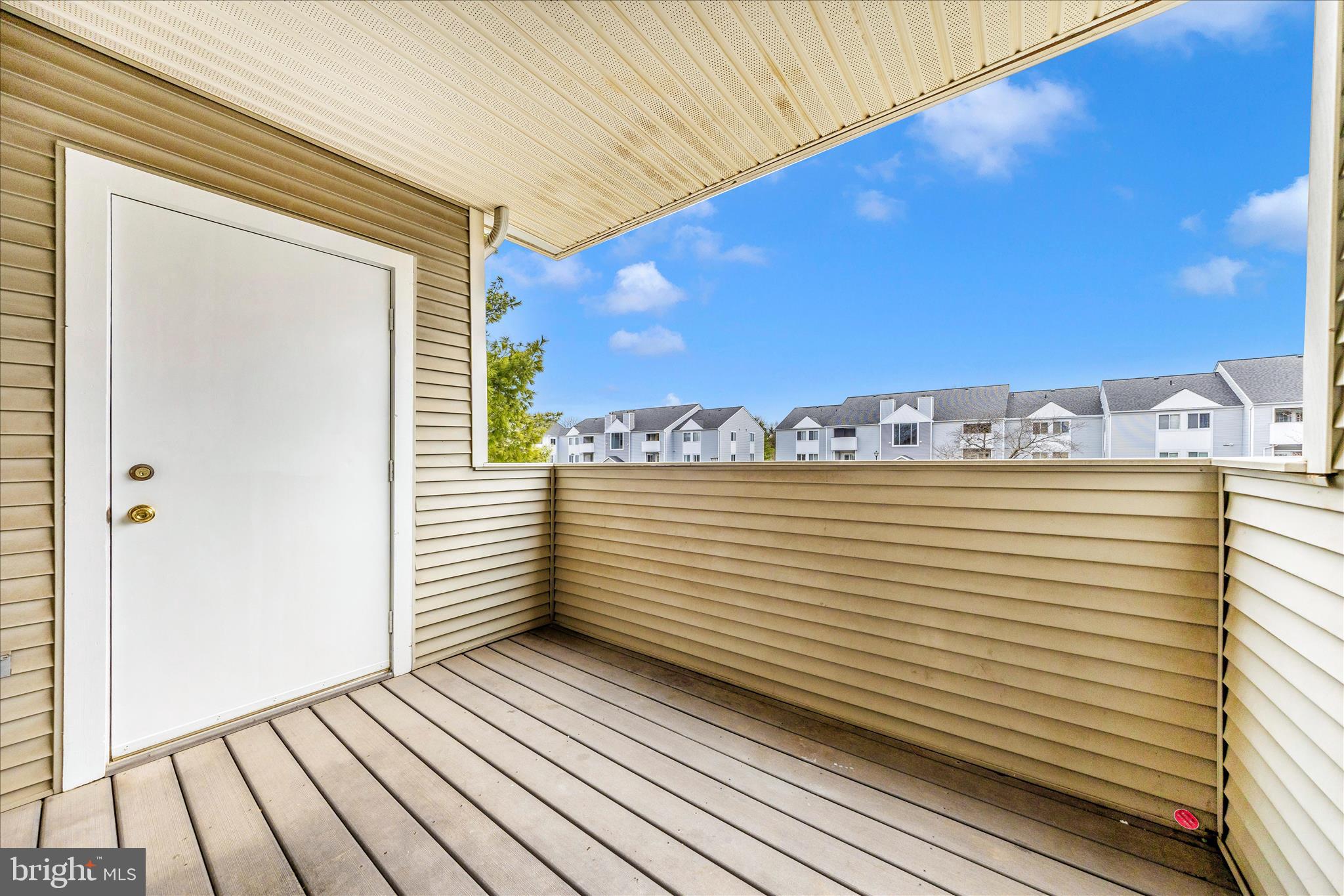 2137 Wainwright Court, Unit 1B Frederick, MD 21702 - Photo 39 of 55 a view of a balcony with two chairs