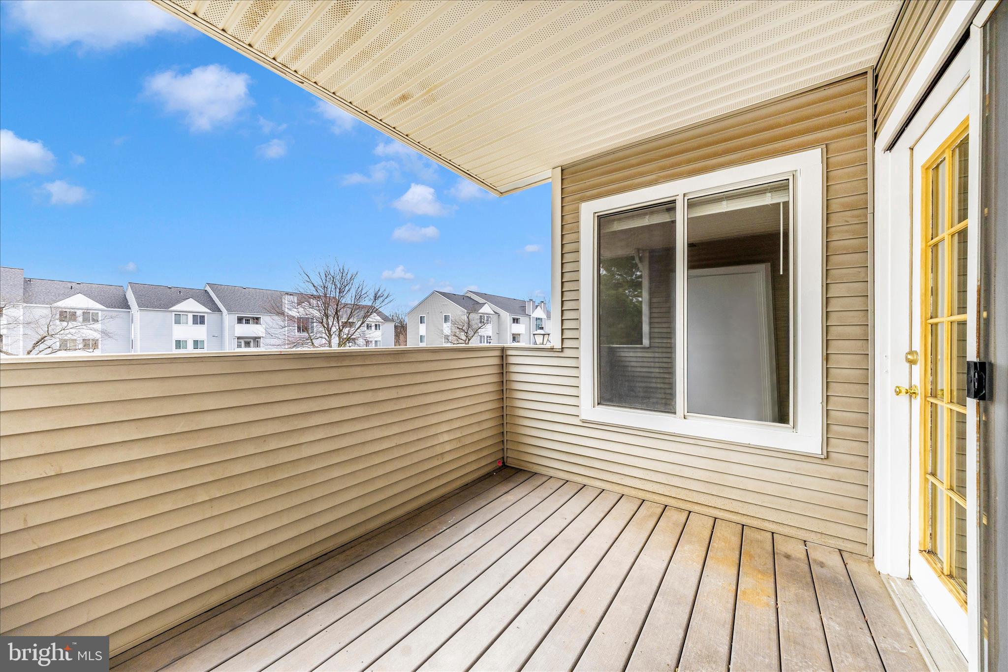 2137 Wainwright Court, Unit 1B Frederick, MD 21702 - Photo 40 of 55 a view of a balcony with wooden floor