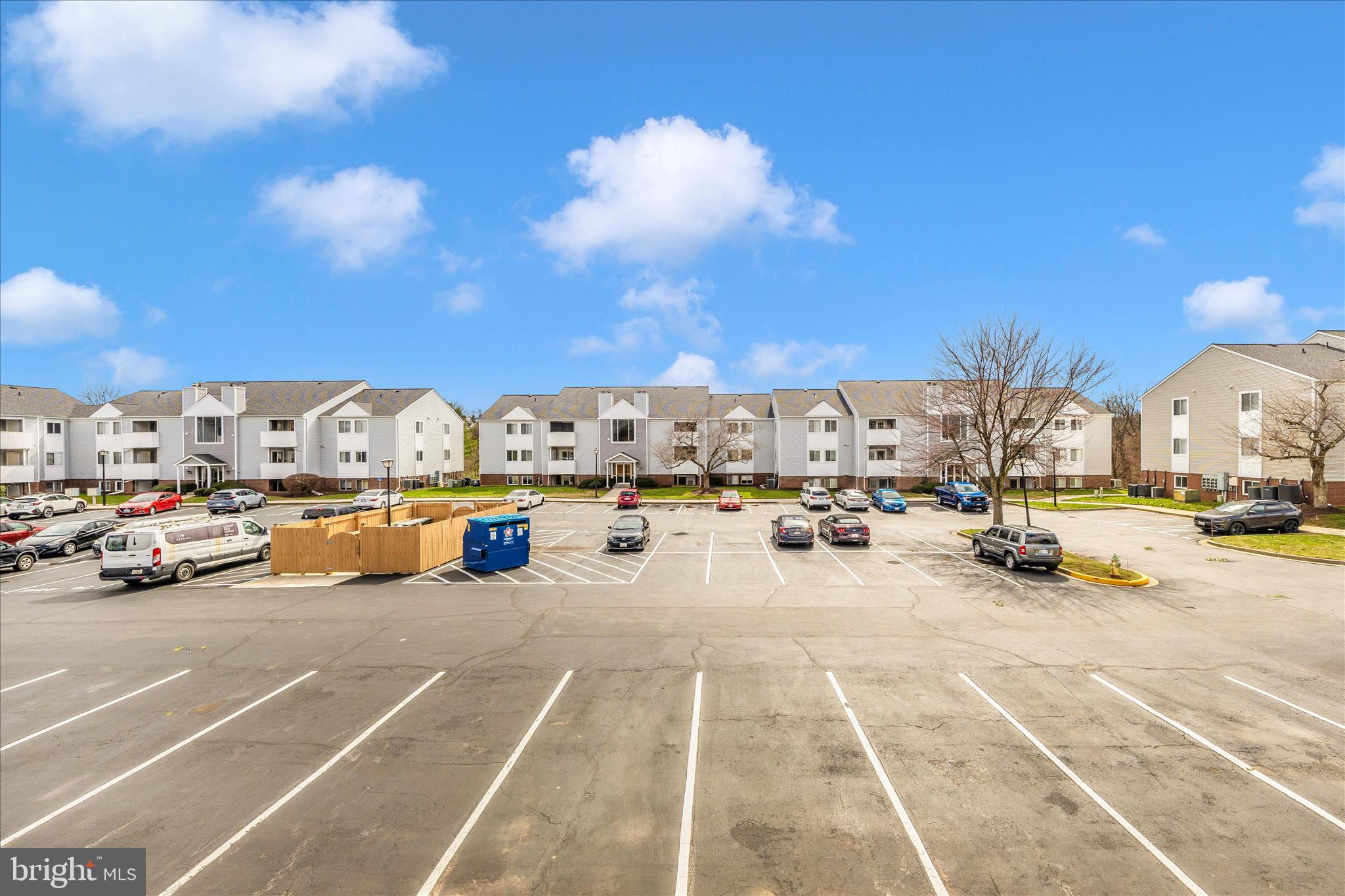 2137 Wainwright Court, Unit 1B Frederick, MD 21702 - Photo 43 of 55 a view of parking with cars parked