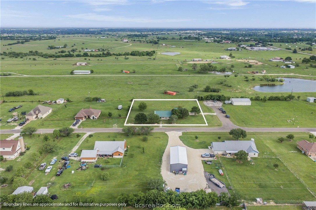 3540 Fisher Ranch Road Bryan, TX 77808 - Photo 29 of 36 a view of a swimming pool with a yard