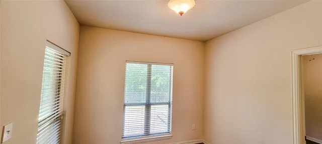 a view of empty room with window