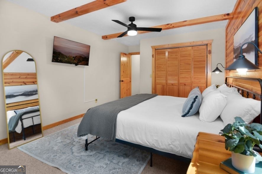 166 Riparian Way Ellijay, GA 30540 - Photo 17 of 34 a bedroom with a bed and a television