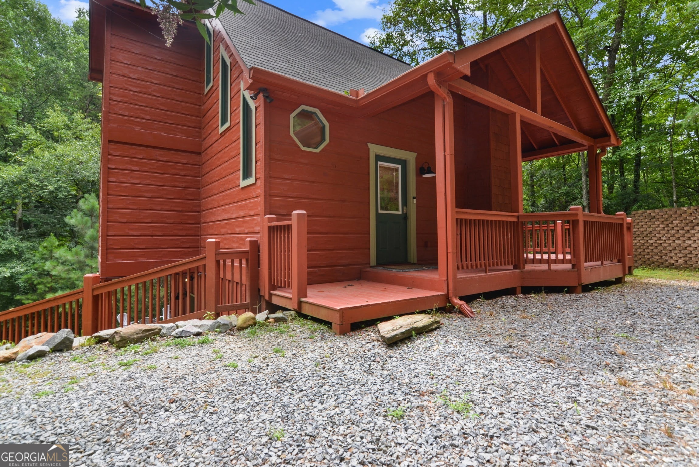 166 Riparian Way Ellijay, GA 30540 - Photo 2 of 34 a backyard of a house with barbeque oven