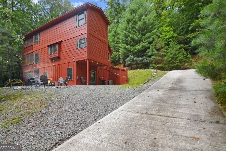 166 Riparian Way Ellijay, GA 30540 - Photo 29 of 34 a view of a house with a yard