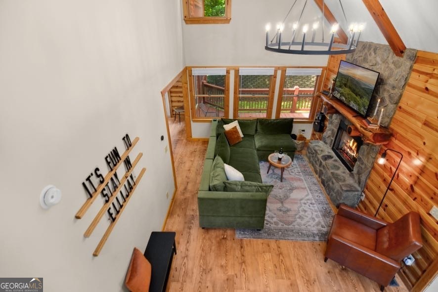 166 Riparian Way Ellijay, GA 30540 - Photo 4 of 34 a living room with furniture and a flat screen tv