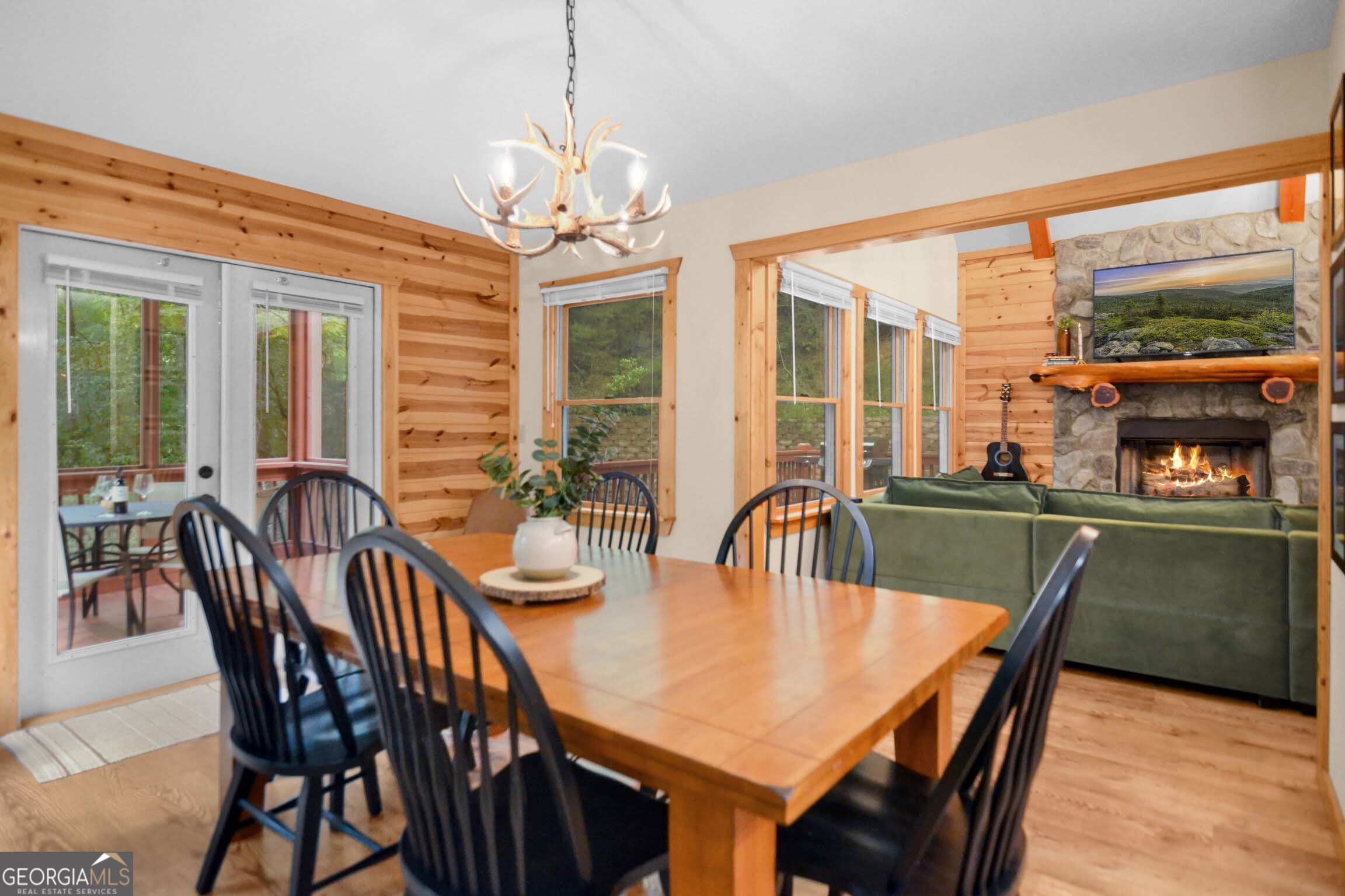 166 Riparian Way Ellijay, GA 30540 - Photo 10 of 34 a view of a dining room with furniture window and wooden floor