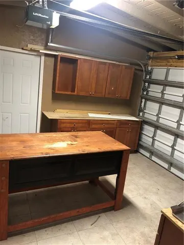 a room with table and chairs