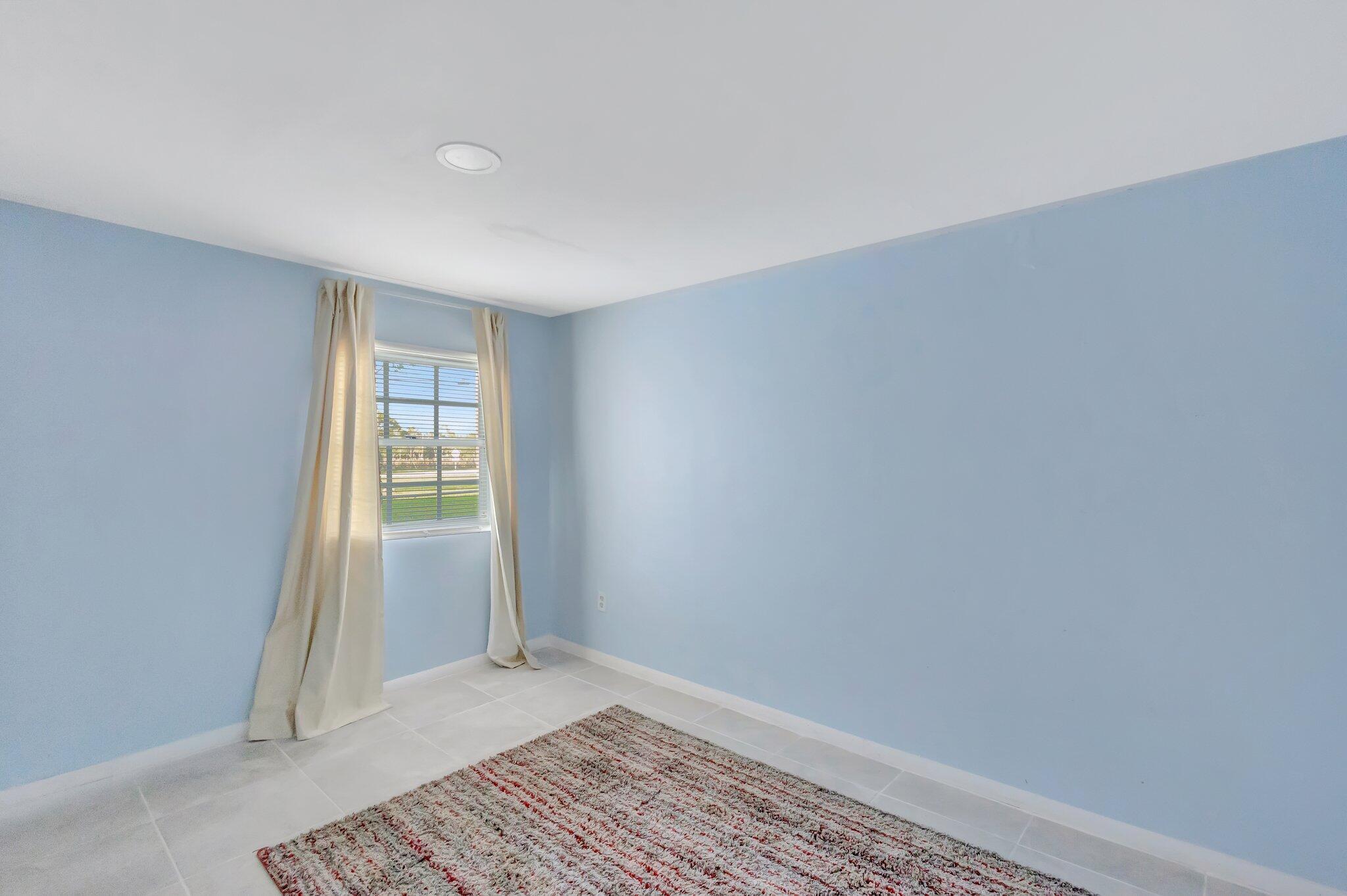 3539 Edwards Road Fort Pierce, FL 34981 - Photo 13 of 39 a view of an empty room and window