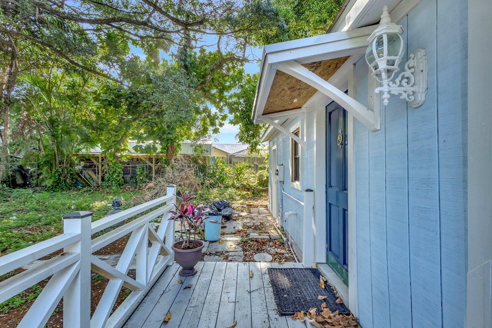 3539 Edwards Road Fort Pierce, FL 34981 - Photo 20 of 39 a view of deck and hardwood
