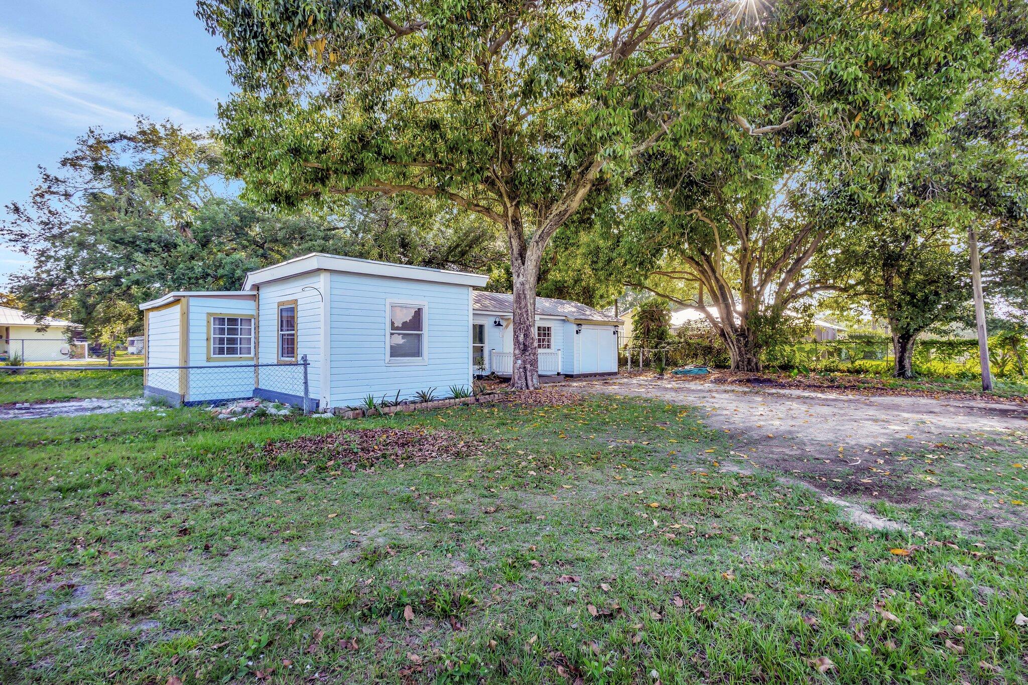 3539 Edwards Road Fort Pierce, FL 34981 - Photo 25 of 39 a view of a house with backyard