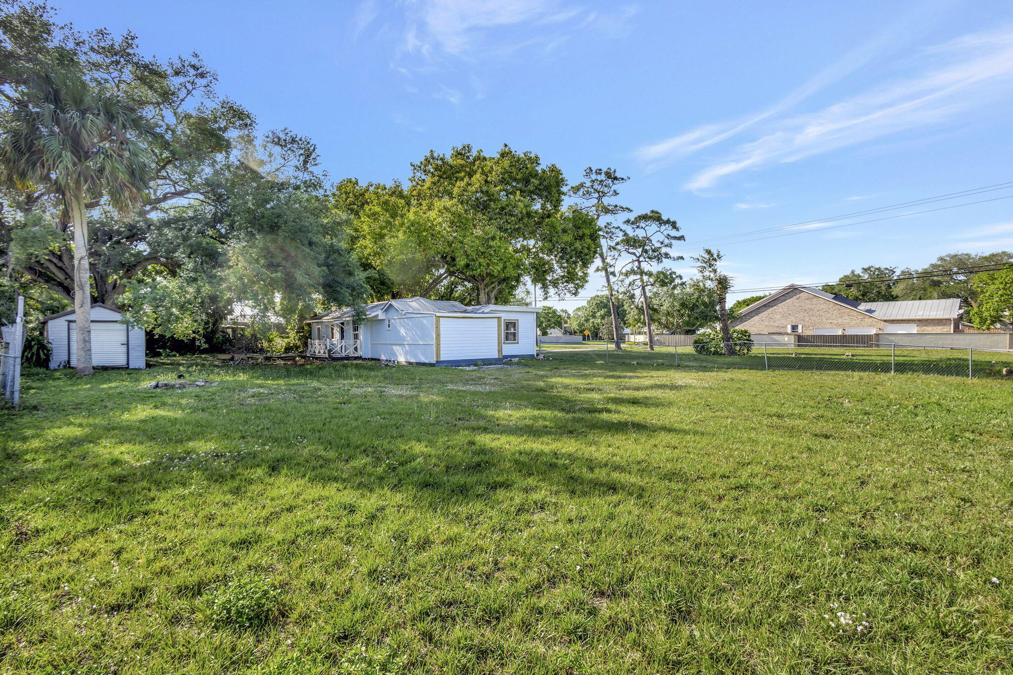 3539 Edwards Road Fort Pierce, FL 34981 - Photo 28 of 39 a view of a house with a yard and sitting area