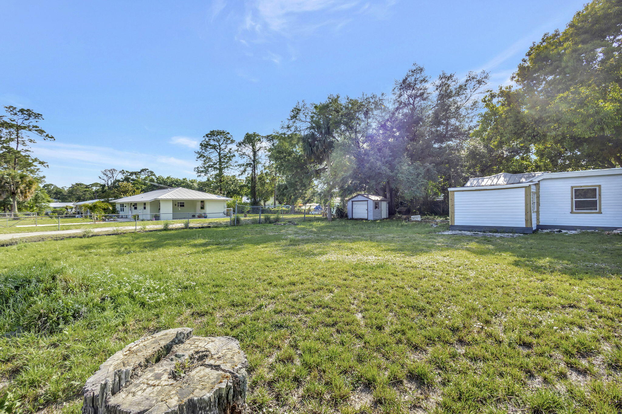 3539 Edwards Road Fort Pierce, FL 34981 - Photo 29 of 39 a view of a house with a yard and sitting area