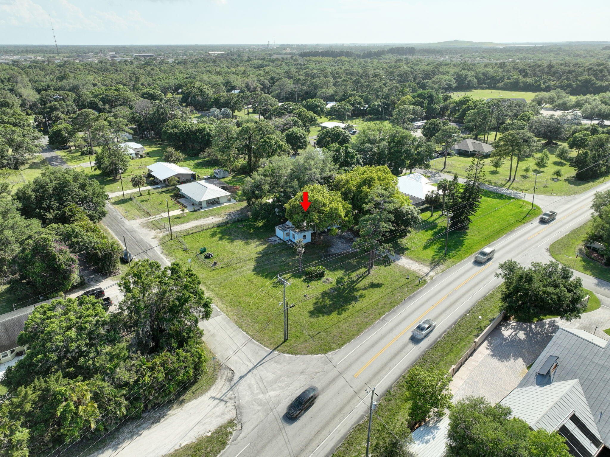 3539 Edwards Road Fort Pierce, FL 34981 - Photo 34 of 39 an aerial view of residential houses with outdoor space and trees