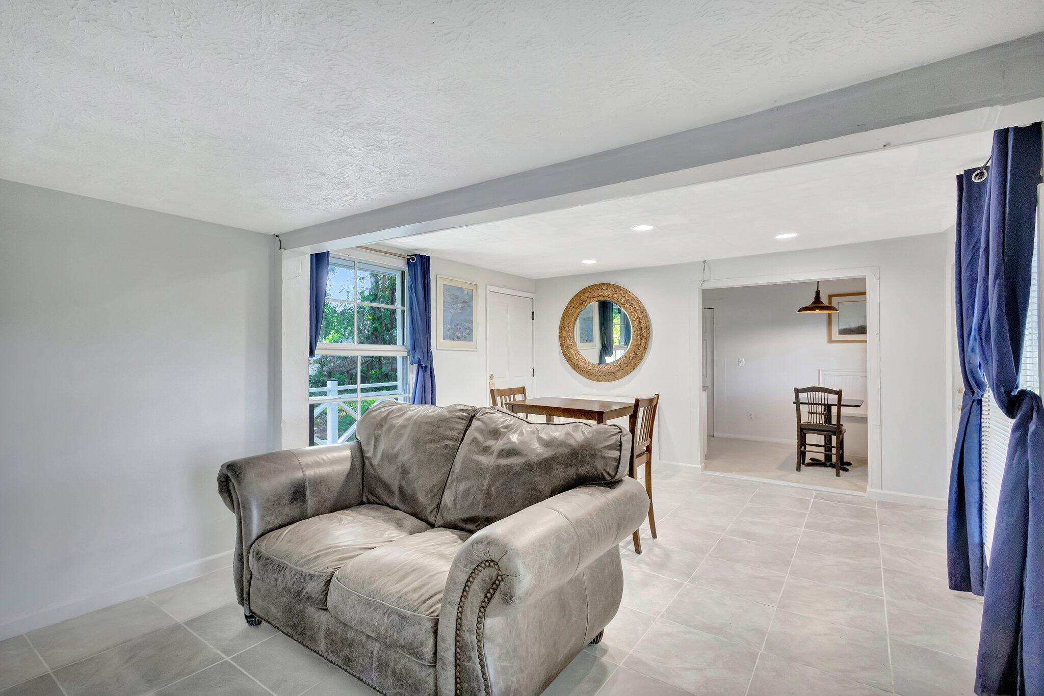 3539 Edwards Road Fort Pierce, FL 34981 - Photo 4 of 39 a living room with furniture and a large window
