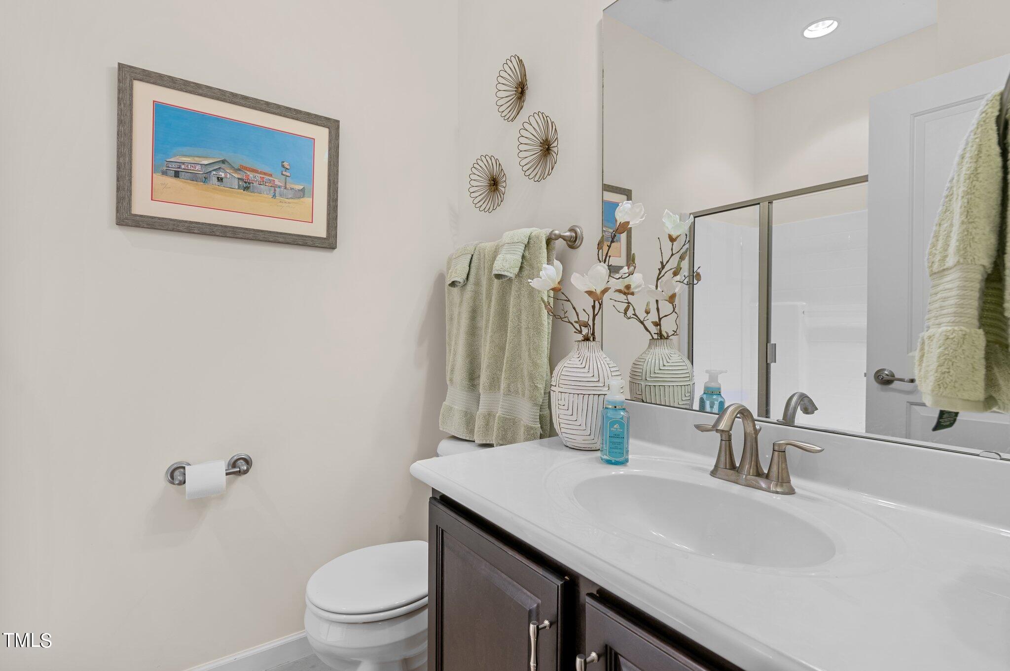 5657 Wade Park Boulevard Raleigh, NC 27607 - Photo 19 of 24 Lower Level Bathroom