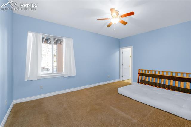 6980 Wildridge Road Colorado Springs, CO 80908 - Photo 14 of 26 Bedroom #2 with walk-in closet