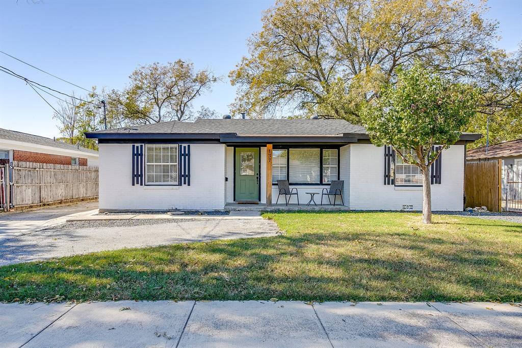 137 Merritt Street Fort Worth, TX 76114 - Photo 1 of 30 a front view of a house with a garden