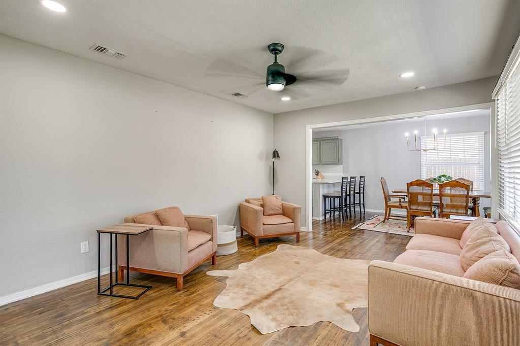 137 Merritt Street Fort Worth, TX 76114 - Photo 2 of 30 a living room with furniture and a ceiling fan