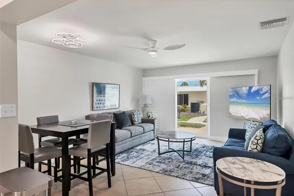 a living room with furniture and a table