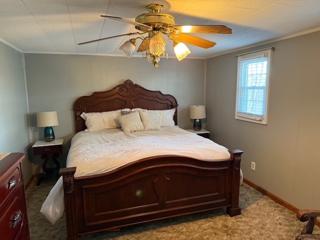 245 Cortner Mill Road Normandy, TN 37360 - Photo 26 of 40 a bedroom with a bed and a chandelier