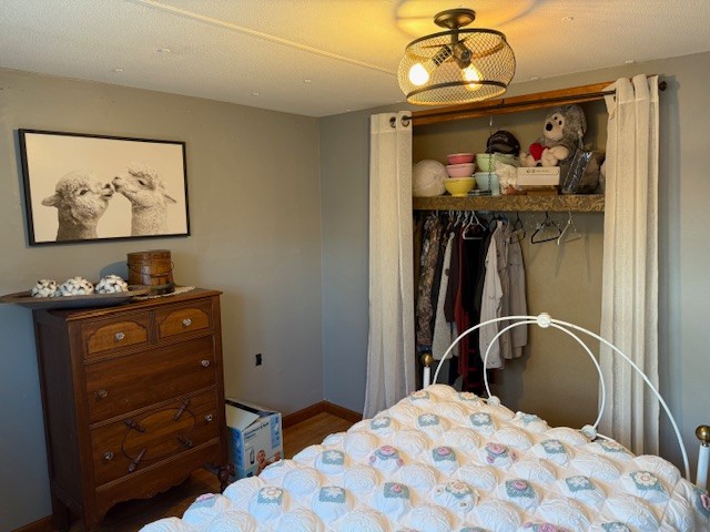 245 Cortner Mill Road Normandy, TN 37360 - Photo 29 of 40 a bedroom with a bed and a cabinet