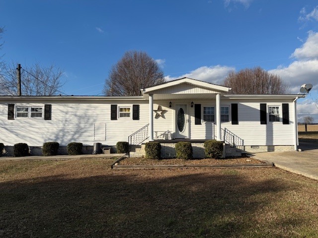 245 Cortner Mill Road Normandy, TN 37360 - Photo 37 of 40 a front view of a house with a yard