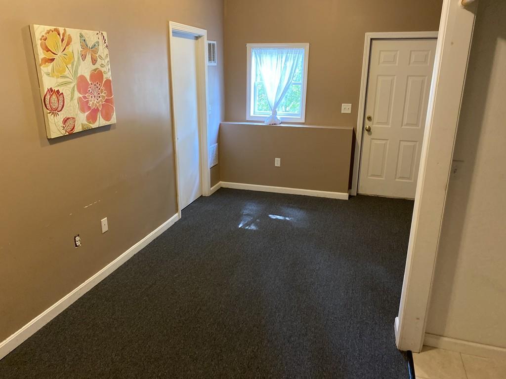 1 Arrowsic Street Worcester, MA 01606 - Photo 17 of 19 an empty room with windows and closet