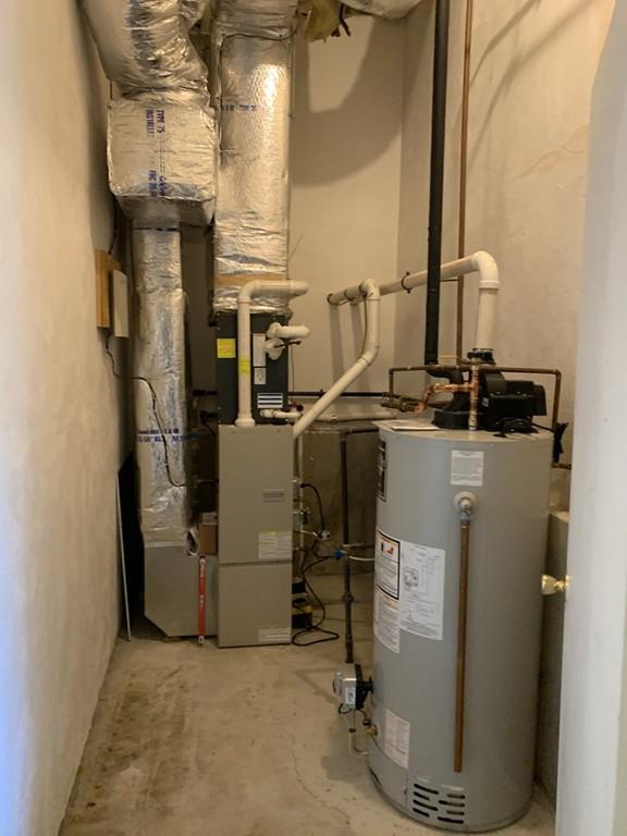 1 Arrowsic Street Worcester, MA 01606 - Photo 19 of 19 a view of storage and utility room with washer and dryer