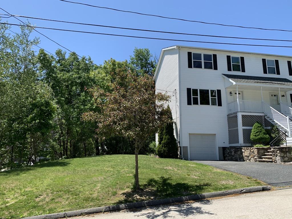 1 Arrowsic Street Worcester, MA 01606 - Photo 2 of 19 a front view of a house with garden